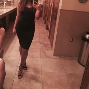 Teal thick strap. U neck on both sides